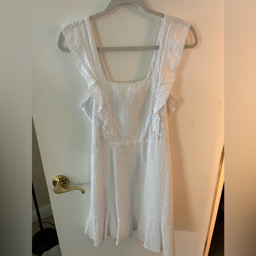 White mini dress, with cut out on back, and tie in back